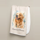 A golden retriever portrait blanket is draped against a beige backdrop.