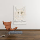 A line art cat canvas hangs beside a brown lounge chair.