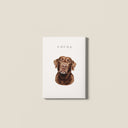 A personalized brown dog portrait canvas on a light beige wall.