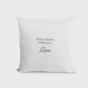 The back of a white Luna pillow shows a short message and her name.