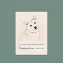 A memorial dog portrait canvas with a name and dates hangs on a sage wall.